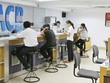 Sau cổ tức, ngân hàng giảm lương, nhân sự